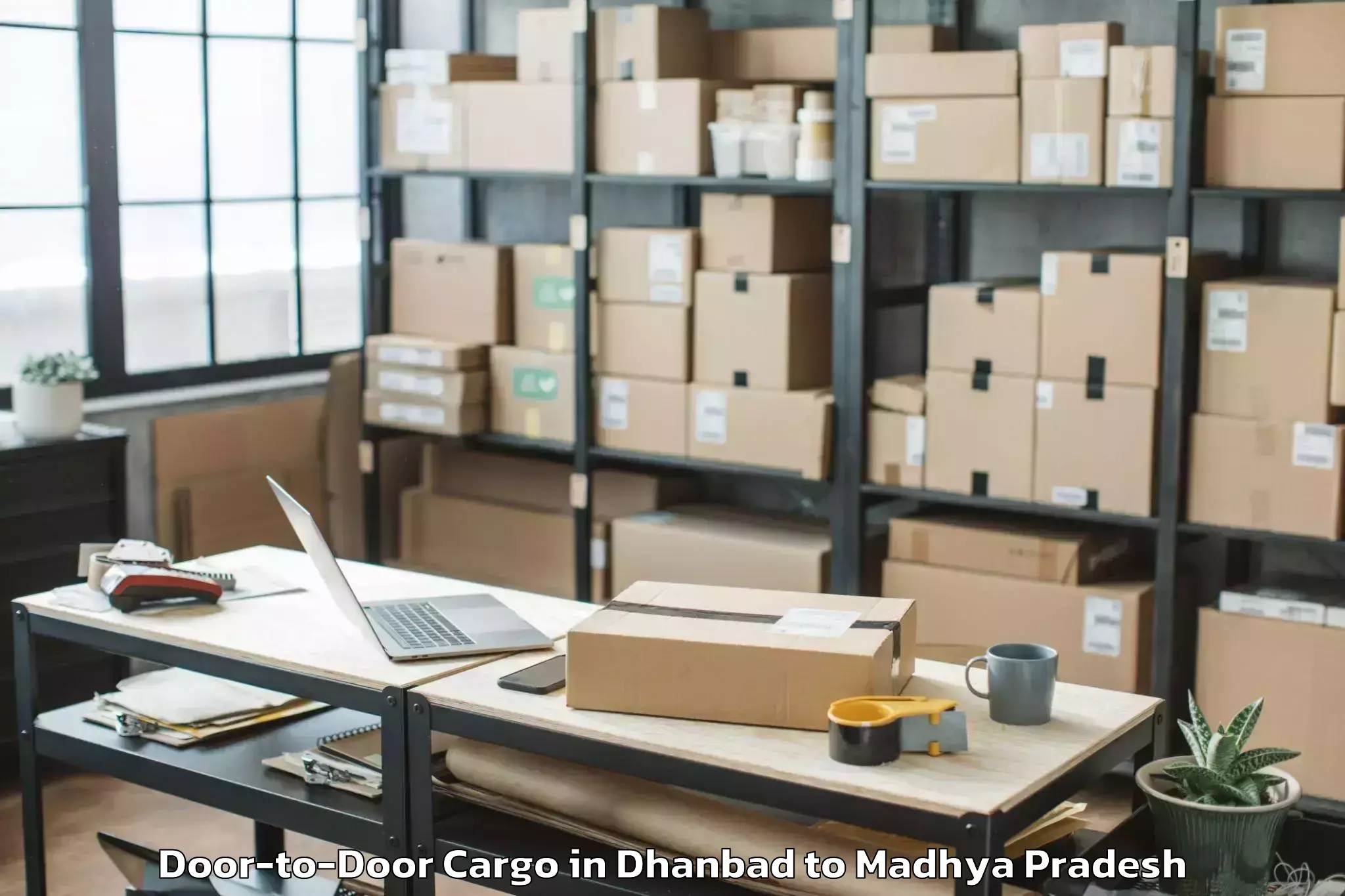 Book Your Dhanbad to Alot Door To Door Cargo Today